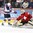 TORONTO, CANADA - JANUARY 2: USA's Colin White #18 attempts to deflect the puck in past Switzerland's Joren van Pottelgerghe #30 during quarterfinal round action at the 2017 IIHF World Junior Championship. (Photo by Matt Zambonin/HHOF-IIHF Images)


